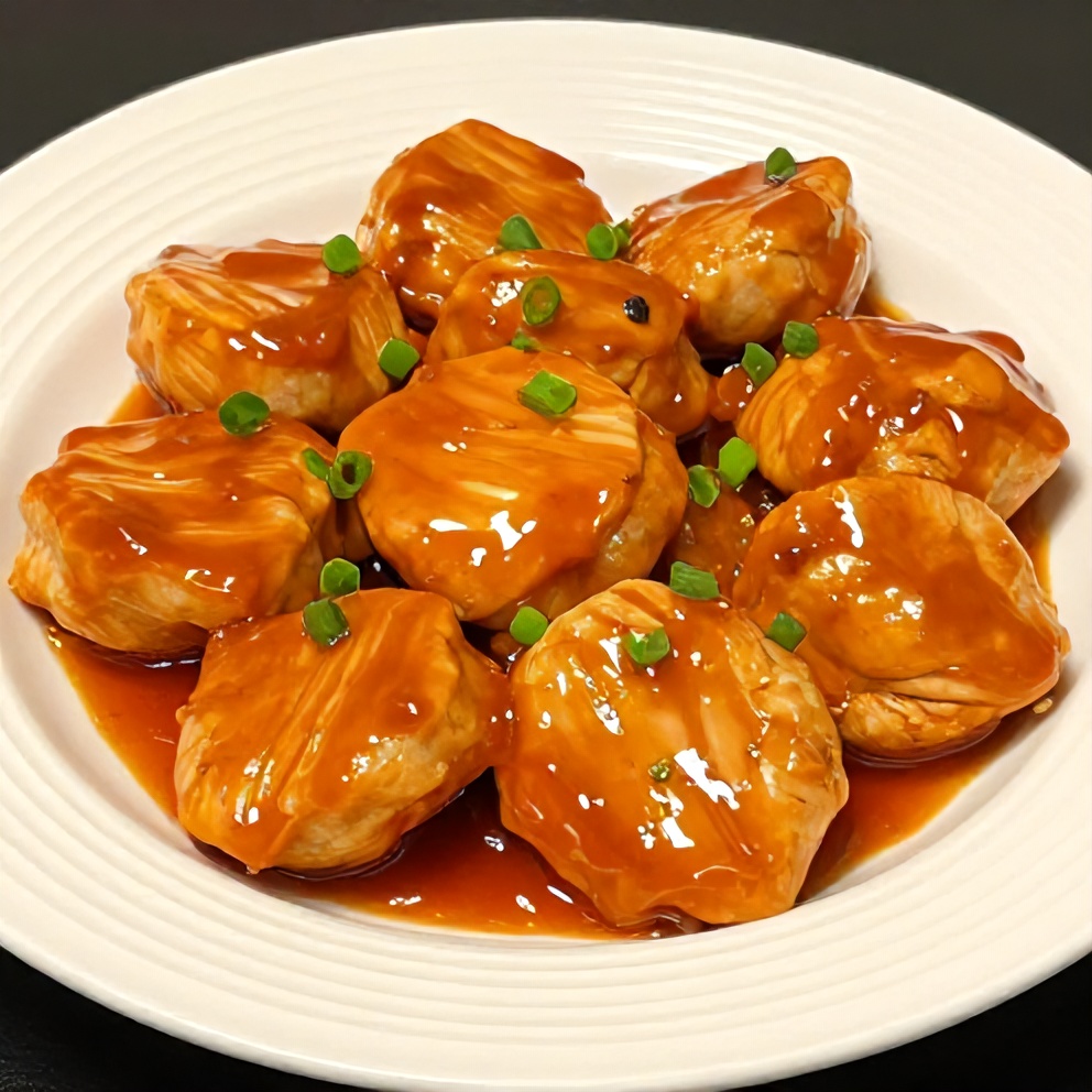 Plated orange teriyaki turkey medallions