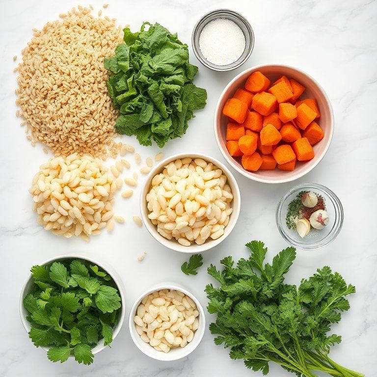 Raw ingredients for Tuscan farro soup including farro, kale, white beans, onions, garlic laid out overhead