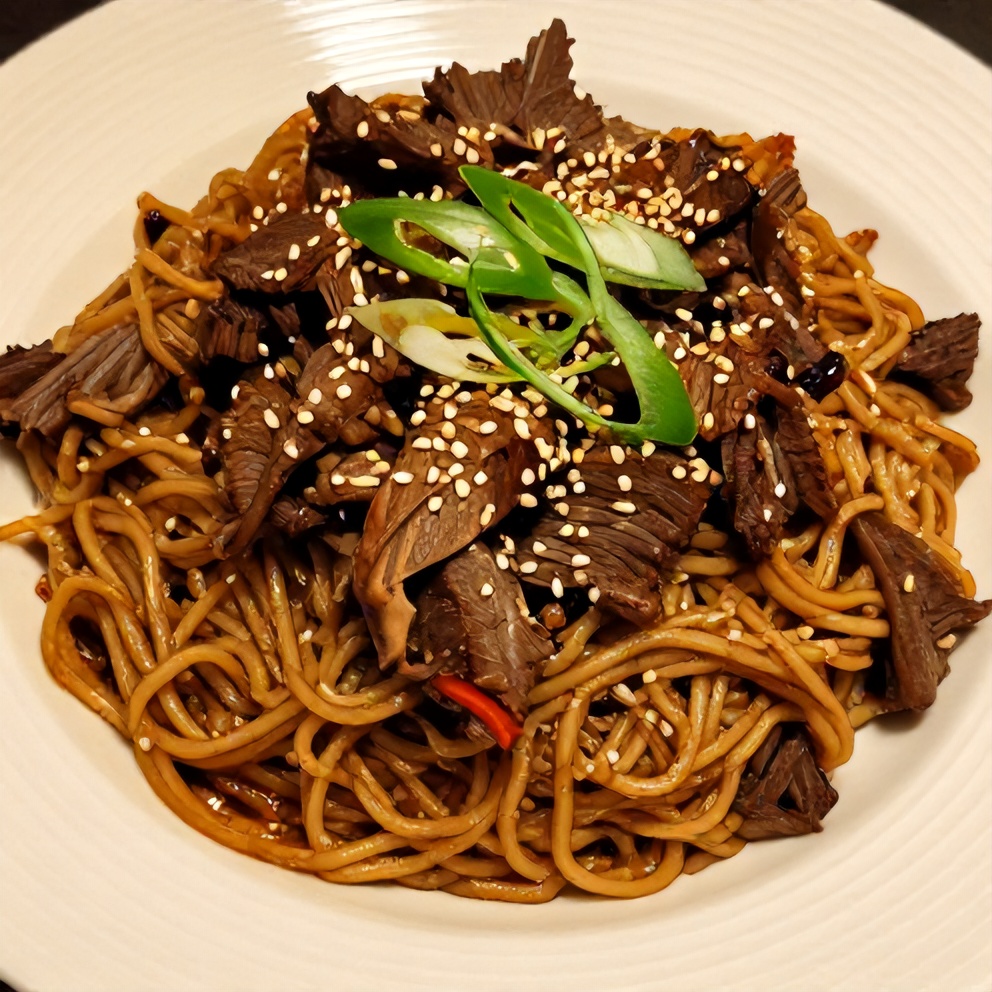Plated Slow Cooker Korean Beef Noodles on a white plate